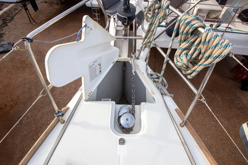  Yacht Photos Pics Deck view of 2013 Jeanneau Sun Odyssey 439 sailboat with anchor chain and ropes.