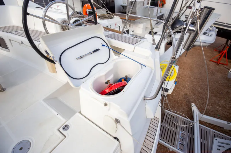  Yacht Photos Pics 2013 Jeanneau Sun Odyssey 439 yacht cockpit with open storage compartment.
