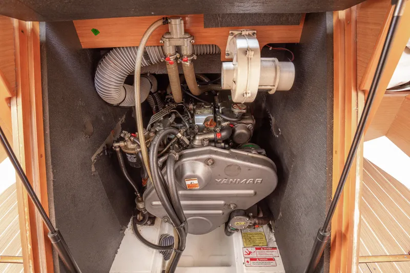  Yacht Photos Pics Engine compartment of 2013 Jeanneau Sun Odyssey 439 sailboat, featuring Yanmar engine.