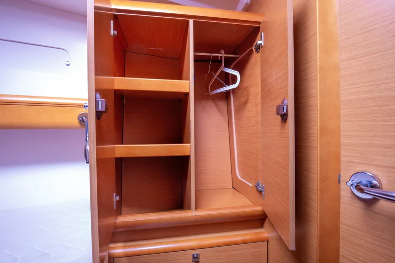 Yacht Photos Pics Wooden wardrobe interior on 2013 Jeanneau Sun Odyssey 439 yacht.