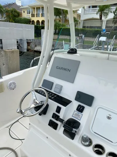 Gone Cucu Yacht Photos Pics Century 3200 Center Console 2020 boat dashboard with Garmin navigation system.