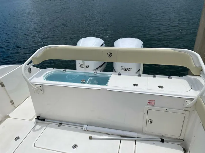 Gone Cucu Yacht Photos Pics Century 3200 Center Console 2020 boat with twin 300 engines on water.