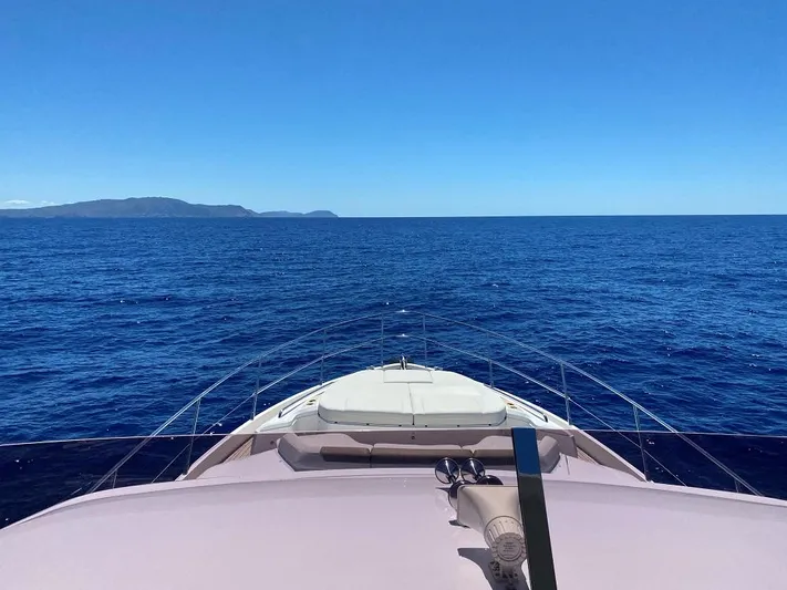 Panamera Yacht Photos Pics Luxury Princess F62 yacht cruising on open sea, clear blue sky, 2020 model.