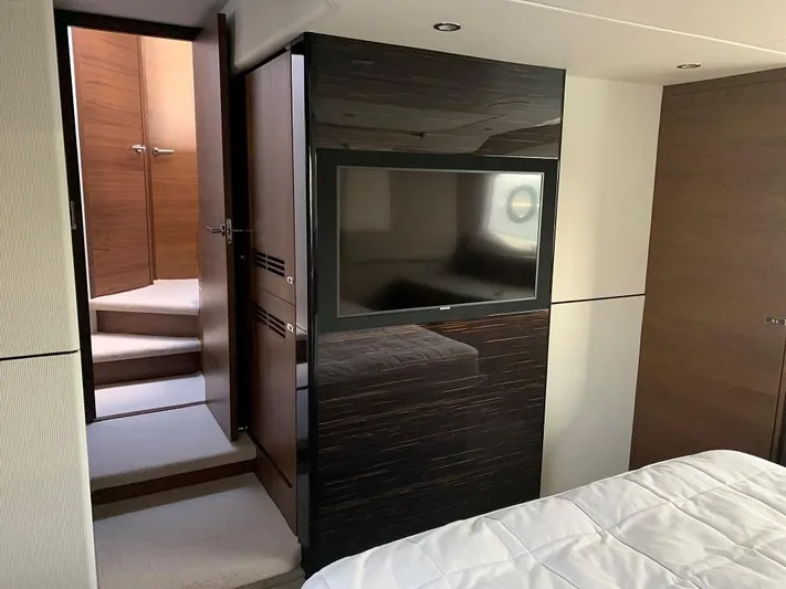 Panamera Yacht Photos Pics Luxurious interior of 2020 Princess F62 yacht with modern design and flat-screen TV.