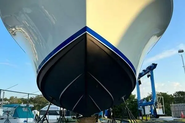 Joujou 2 Yacht Photos Pics 2002 Luhrs 38 Open boat hull on dry dock, viewed from the front.