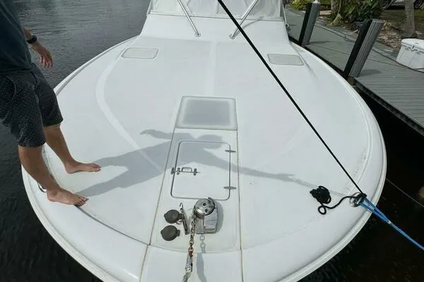 Joujou 2 Yacht Photos Pics 2002 Luhrs 38 Open boat deck with anchor and mooring line.
