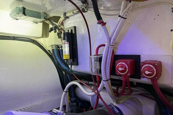 Joujou 2 Yacht Photos Pics Engine room wiring and switches in a 2002 Luhrs 38 Open boat.