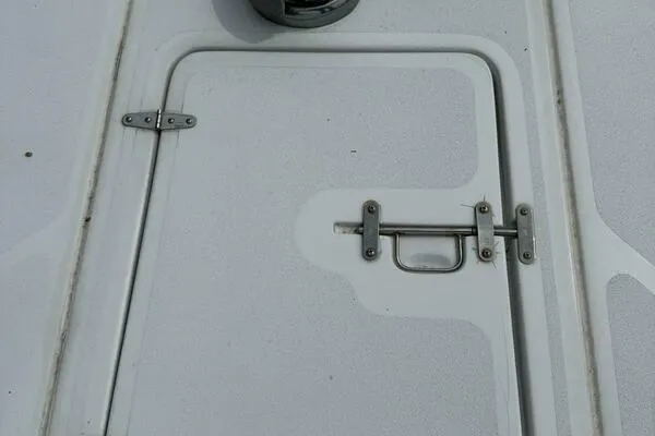 Joujou 2 Yacht Photos Pics Hatch door with latch on 2002 Luhrs 38 Open boat deck.