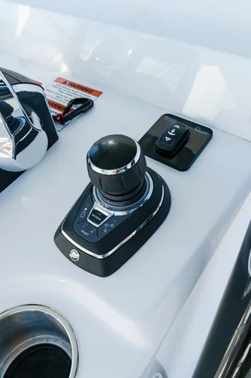  Yacht Photos Pics 2025 Invincible 36 Open Fisherman boat control panel with joystick and buttons.