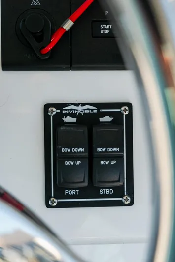  Yacht Photos Pics Control panel of 2025 Invincible 36 Open Fisherman boat, featuring bow adjustment switches.