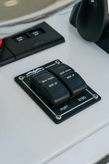  Yacht Photos Pics Control panel of 2025 Invincible 36 Open Fisherman boat, featuring port and starboard switches.