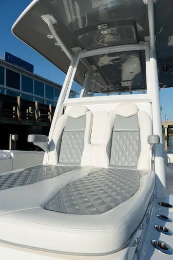  Yacht Photos Pics 2025 Invincible 36 Open Fisherman boat with luxurious seating and modern design.
