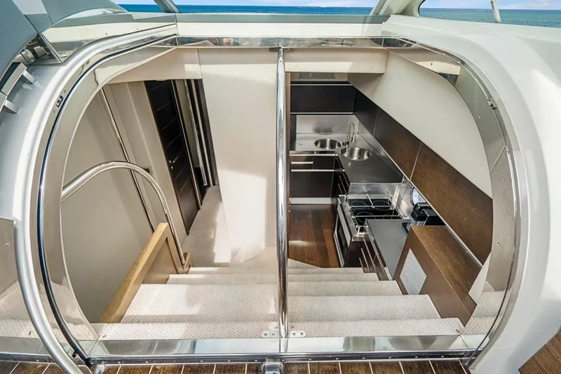  Yacht Photos Pics Luxurious interior of 2007 Azimut 68S yacht featuring modern kitchen and sleek design.