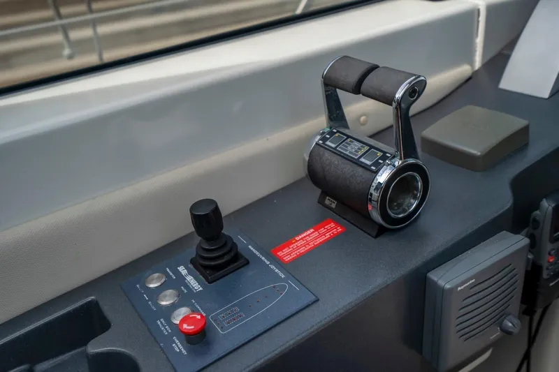  Yacht Photos Pics Control panel of a 2007 Azimut 68S yacht, featuring throttle and joystick controls.