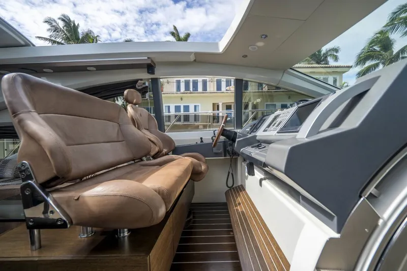  Yacht Photos Pics Interior of 2007 Azimut 68S yacht with luxurious leather seating and modern dashboard.