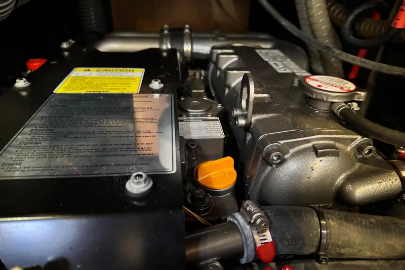 Shades Of Grey Yacht Photos Pics Engine compartment of a 2016 Beneteau Oceanis 48 sailboat, showing detailed components.