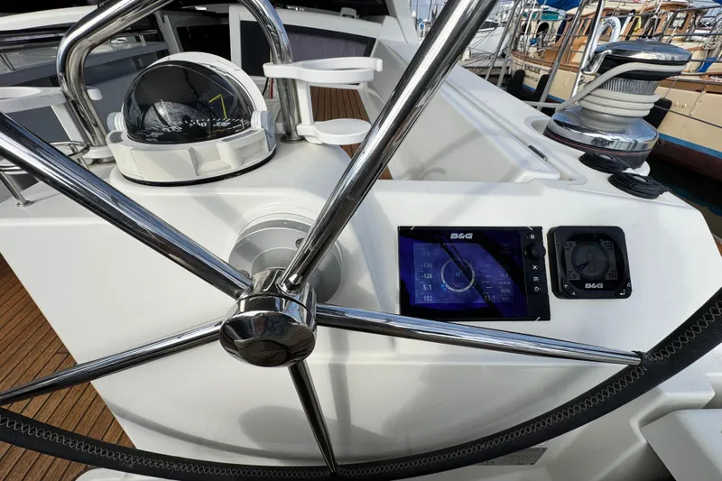 Shades Of Grey Yacht Photos Pics Steering wheel and navigation instruments on 2016 Beneteau Oceanis 48 yacht.