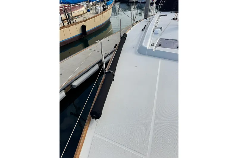 Shades Of Grey Yacht Photos Pics 2016 Beneteau Oceanis 48 yacht deck, docked at marina, showing sleek design and rigging.
