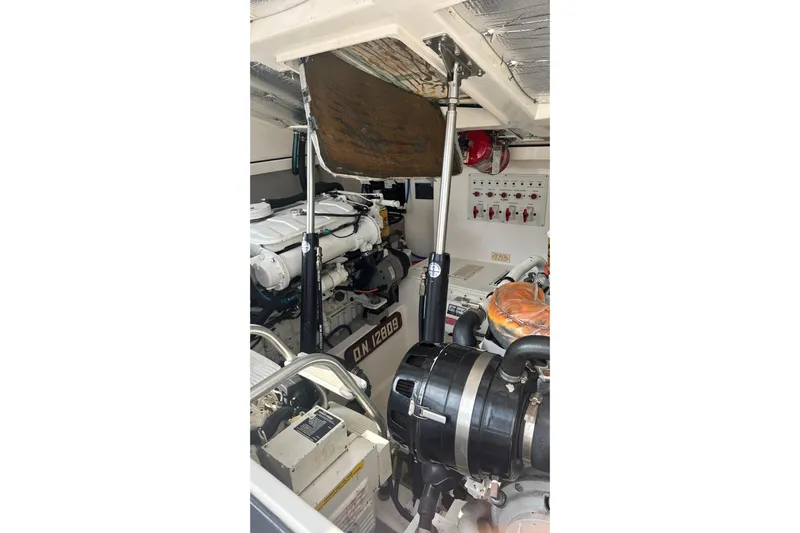 Shades Of Grey Yacht Photos Pics Engine room of 2016 Beneteau Oceanis 48 yacht, showcasing mechanical components and systems.