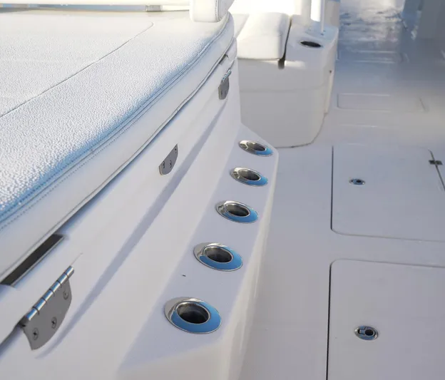Another One Yacht Photos Pics 2019 Invincible 40 Catamaran interior with rod holders and seating.