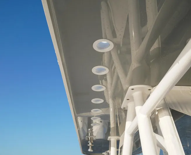 Another One Yacht Photos Pics 2019 Invincible 40 Catamaran, underside view with structural details against blue sky.