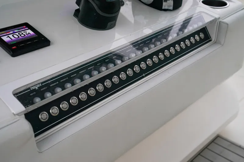 Another One Yacht Photos Pics Control panel of a 2019 Invincible 40 Catamaran with multiple buttons and a digital display.