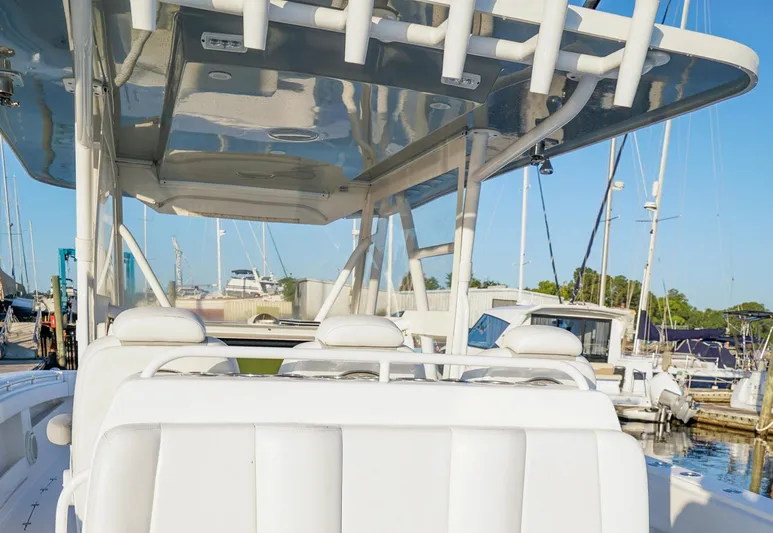 Another One Yacht Photos Pics 2019 Invincible 40 Catamaran at marina, showcasing sleek design and spacious seating.