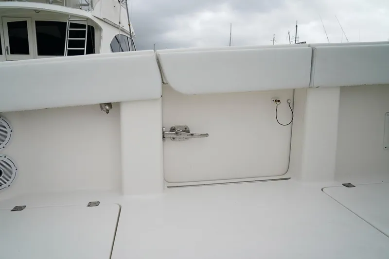 Another One Yacht Photos Pics 2019 Invincible 40 Catamaran deck with storage compartment and speakers.