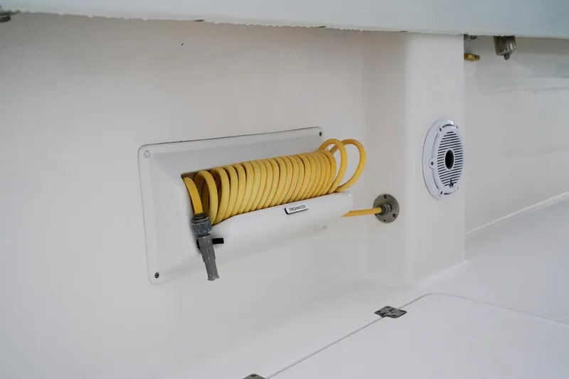 Another One Yacht Photos Pics Yellow hose and speaker on 2019 Invincible 40 Catamaran deck.