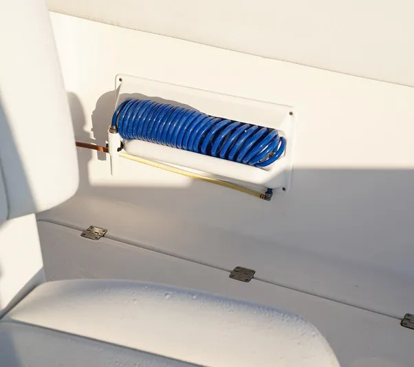 Another One Yacht Photos Pics Coiled blue hose on 2019 Invincible 40 Catamaran deck.