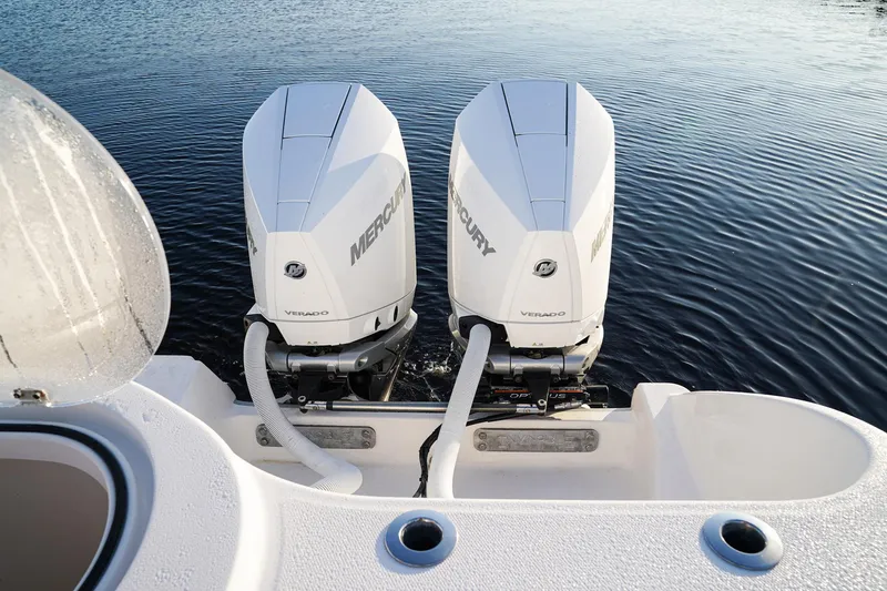 Another One Yacht Photos Pics Twin Mercury outboard engines on a 2019 Invincible 40 Catamaran, cruising on calm water.