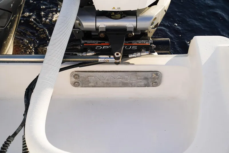 Another One Yacht Photos Pics Close-up of 2019 Invincible 40 Catamaran engine area with branding plate.
