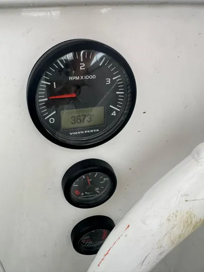  Yacht Photos Pics Close-up of Viking 44 Convertible 2019 boat dashboard with RPM and fuel gauges.
