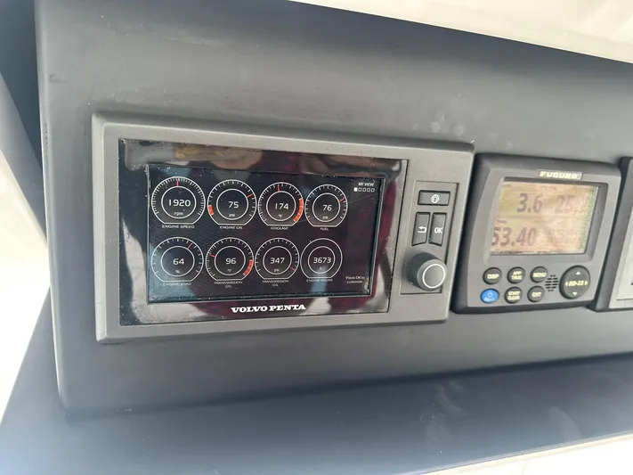  Yacht Photos Pics Control panel of a 2019 Viking 44 Convertible boat with Volvo Penta display.