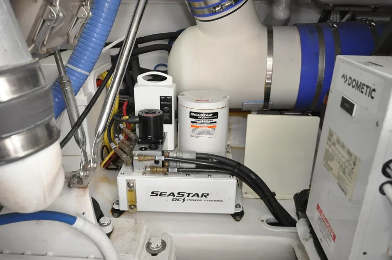  Yacht Photos Pics Engine room of 2019 Viking 44 Convertible with SeaStar hydraulic system and Dometic equipment.