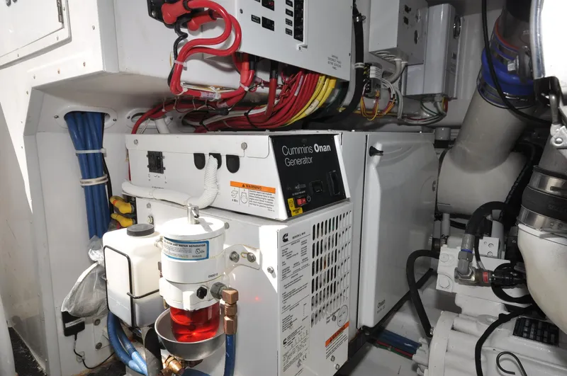  Yacht Photos Pics Engine room of 2019 Viking 44 Convertible with Cummins Onan generator and wiring.