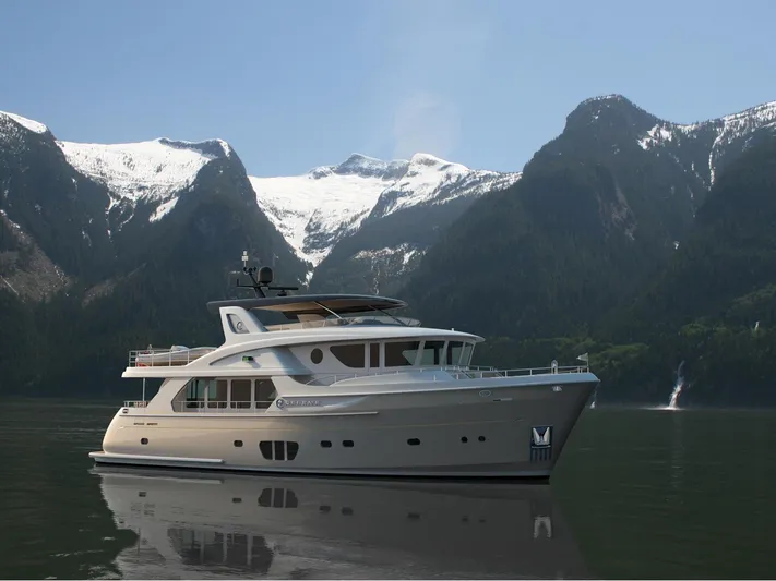  Yacht Photos Pics Luxury yacht Selene 78 Explorer 2026 cruising in scenic mountain waters.