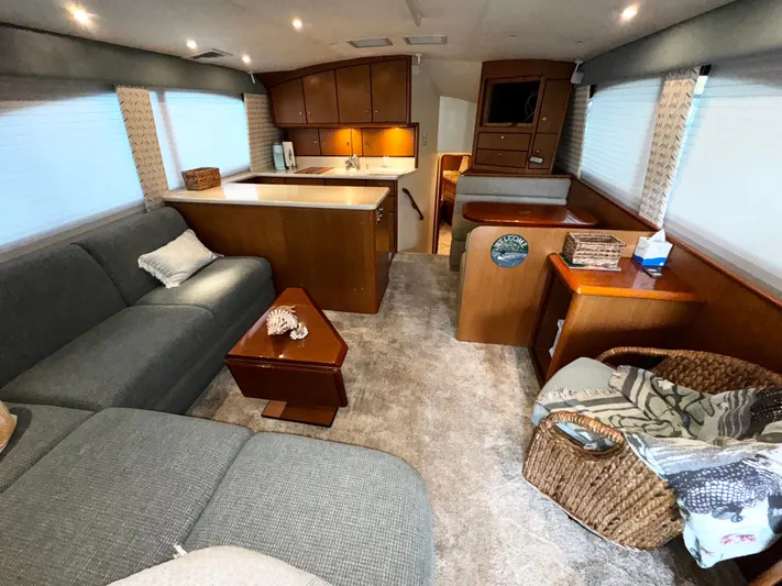 Loon Atik Yacht Photos Pics Luxurious interior of 2005 Ocean Yachts 46 Super Sport with cozy seating and elegant decor.