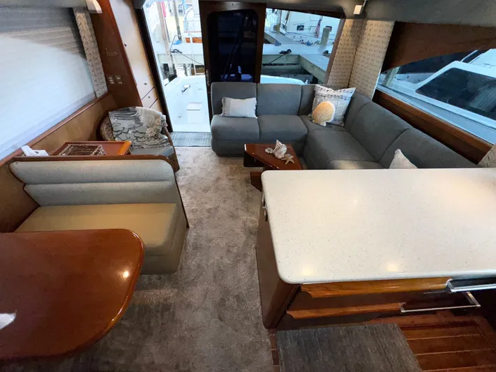 Loon Atik Yacht Photos Pics Luxurious interior of 2005 Ocean Yachts 46 Super Sport with modern seating and elegant decor.