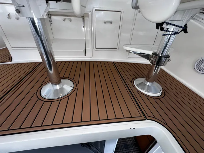 Loon Atik Yacht Photos Pics Teak deck of 2005 Ocean Yachts 46 Super Sport with mounted seating.