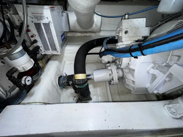 Loon Atik Yacht Photos Pics Engine room of 2005 Ocean Yachts 46 Super Sport with visible machinery and components.