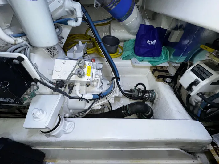 Loon Atik Yacht Photos Pics Engine room of 2005 Ocean Yachts 46 Super Sport with mechanical components and wiring.