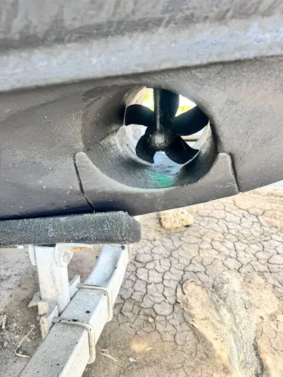  Yacht Photos Pics Close-up of 2012 Boston Whaler 345 Conquest propeller on a trailer.