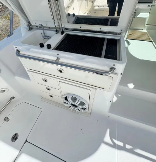  Yacht Photos Pics 2012 Boston Whaler 345 Conquest boat galley with sink and grill.