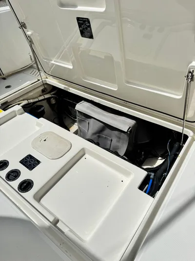  Yacht Photos Pics 2012 Boston Whaler 345 Conquest engine compartment with open hatch.