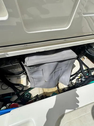 Yacht Photos Pics 2012 Boston Whaler 345 Conquest engine compartment with protective cover.