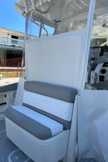 Pura Vida Yacht Photos Pics 2008 Hydra-Sports Vector 3500 VX boat seating area with white and gray cushions.