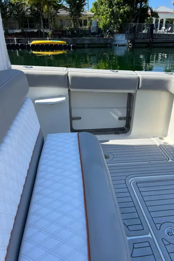 Pura Vida Yacht Photos Pics 2008 Hydra-Sports Vector 3500 VX boat interior with white and gray seating.