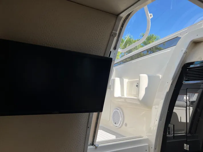 Pura Vida Yacht Photos Pics Interior view of 2008 Hydra-Sports Vector 3500 VX with TV and open door.