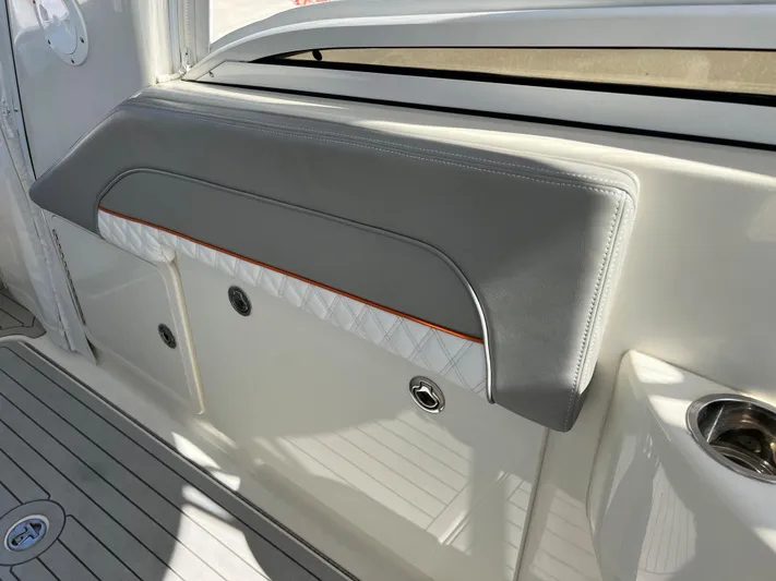 Pura Vida Yacht Photos Pics 2008 Hydra-Sports Vector 3500 VX interior detail with gray and white upholstery.